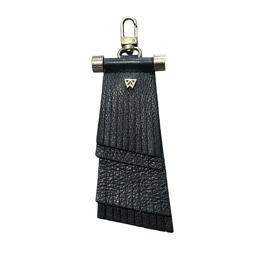 Kelly Wynne Keychain Leather Fringe Tassel Black Designer Boho Metal Logo Charm